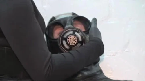 Mistresses Force Gas Mask on Rubber Slave: Watch on SadoOnly